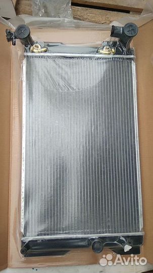 Радиатор основной на toyota corolla axio NZE140