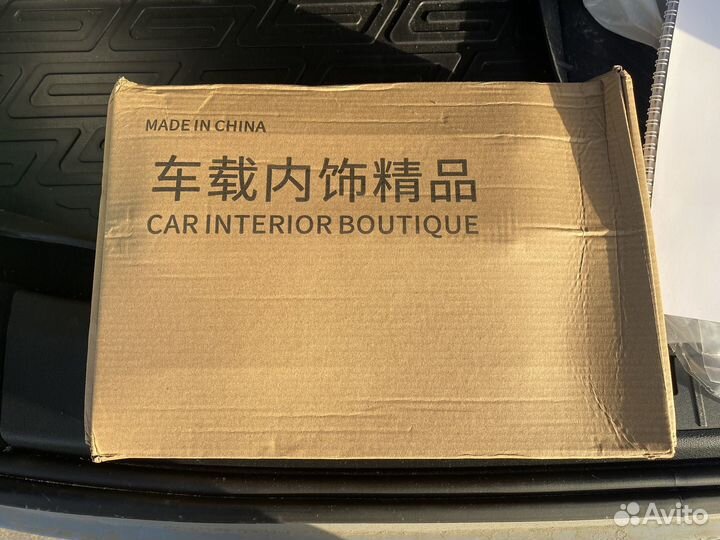 Органайзер в авто Geely