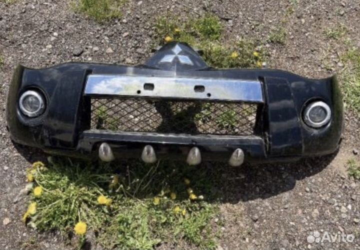 Бампер передний Mitsubishi L200 IV 2006-2014