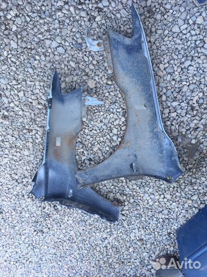 Mitsubishi lancer 10 переднее крыло
