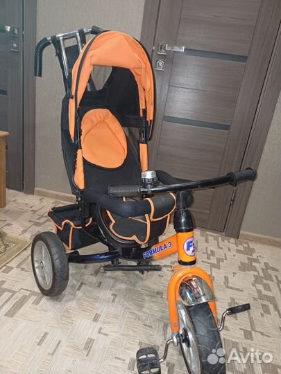 Трехколесный велосипед с родительской ручкой