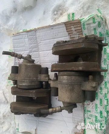 Передние суппорта с колодками (компл) VAG