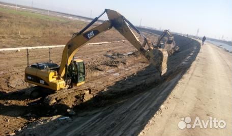 Система нивелирования на экскаватор