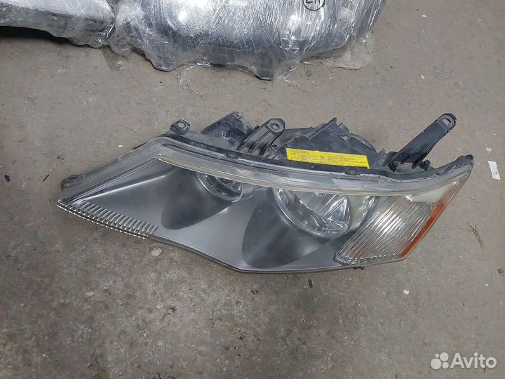 Фара левая mitsubishi outlander xl ксенон