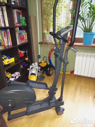 Эллиптический тренажер torneo