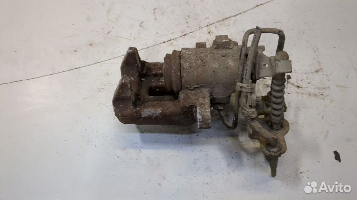 Суппорт левый задний Volkswagen Caddy