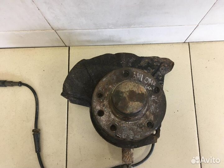 Кулак поворотный передний левый Omega B 1994-2003