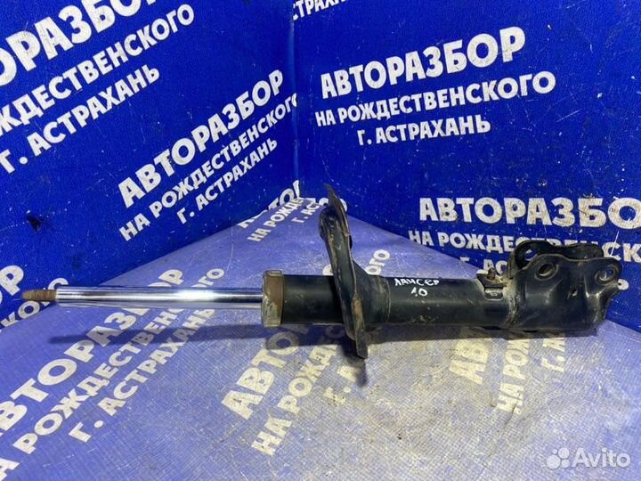 Передняя левая стойка амортизатора Mitsubishi