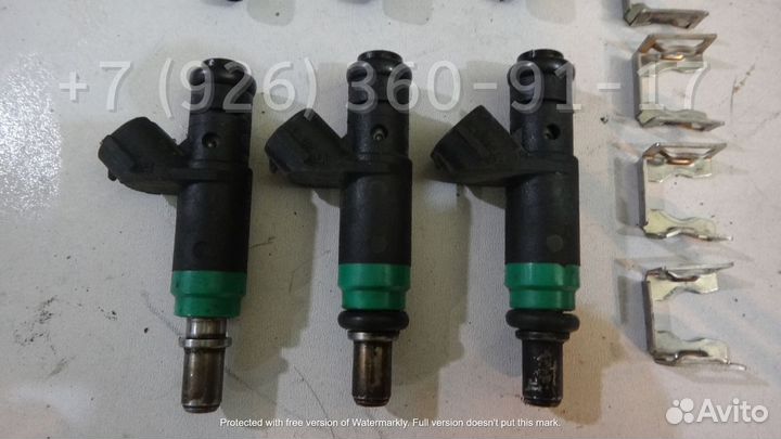 Форсунка топливная Ауди 06C133551