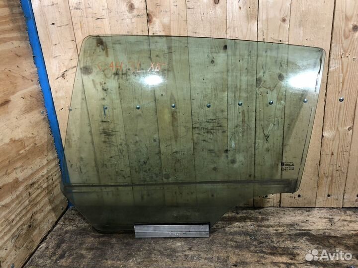 Стекло задней левой двери Opel Astra H