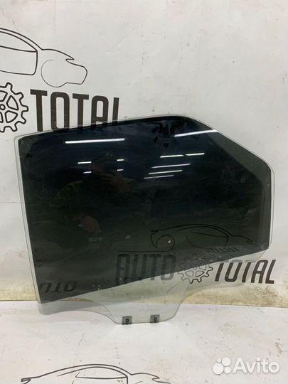 Стекло двери заднее левое Renault Logan K7J710