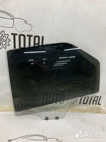 Стекло двери заднее левое Renault Logan K7J710