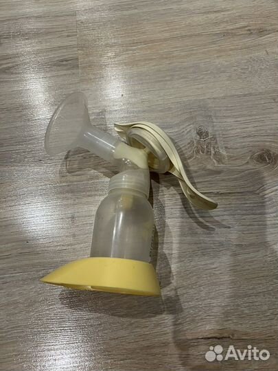Молокоотсос medela ручной
