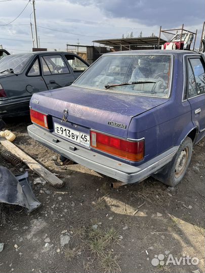 Фонарь задний левый правый Mazda 323 BF