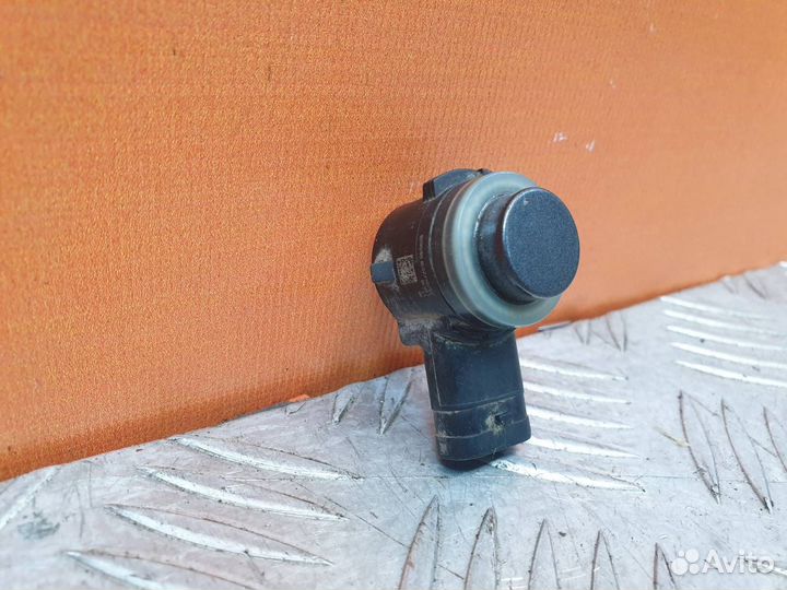 Датчик парктроника передний Toyota Corolla 11 E160