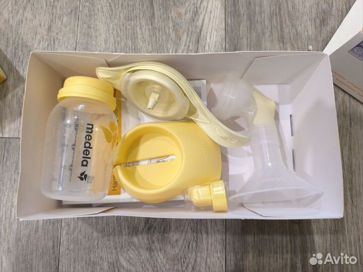 Молокоотсос medela