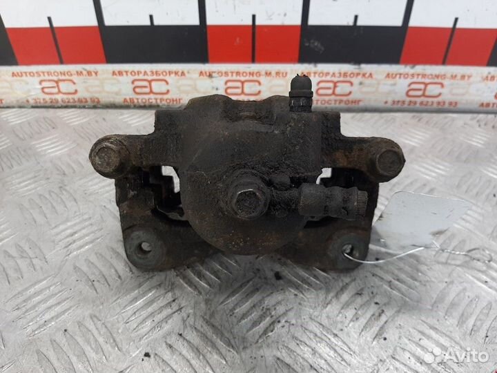 Суппорт передний правый Nissan Almera N15 1999