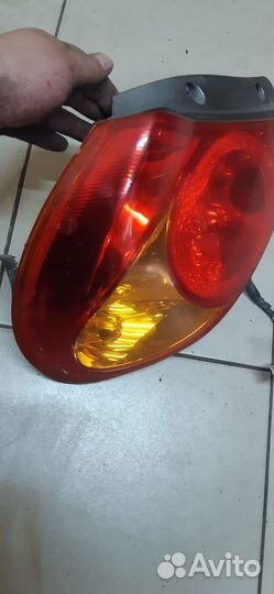 Фонарь задний левый Kia Spectra