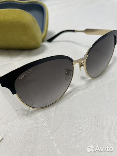 Солнцезащитные очки Gucci