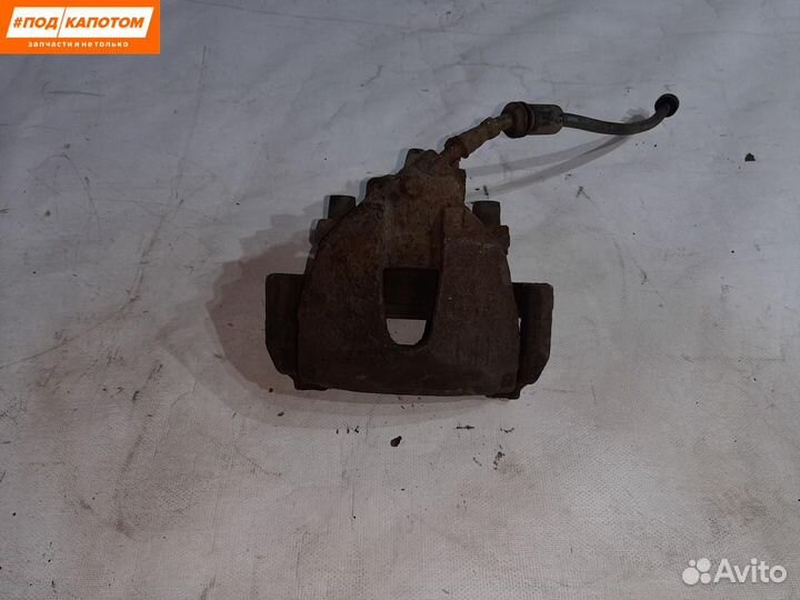 Суппорт тормозной передний левый Ford Focus