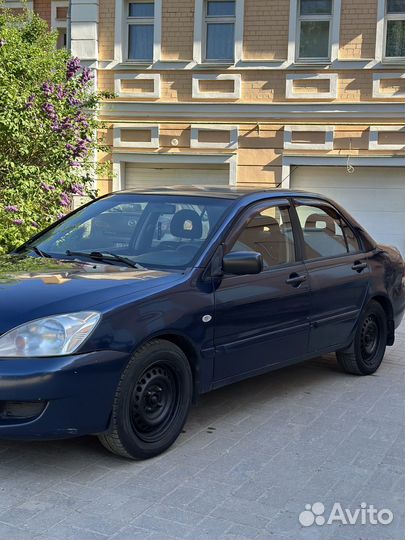 Mitsubishi Lancer 1.3 МТ, 2006, 165 000 км