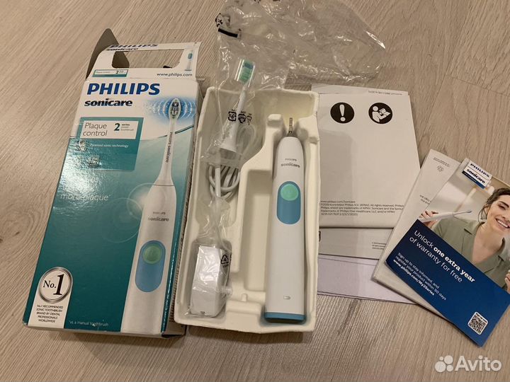 Электрическая зубная щетка philips новая