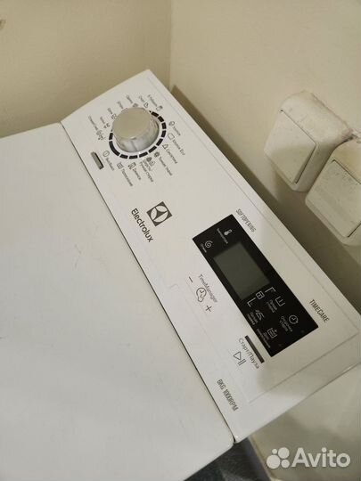 Стиральная машина с вертикальной загрузкой