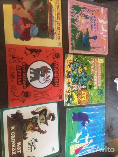 Виниловые пластинки и проигрыватель