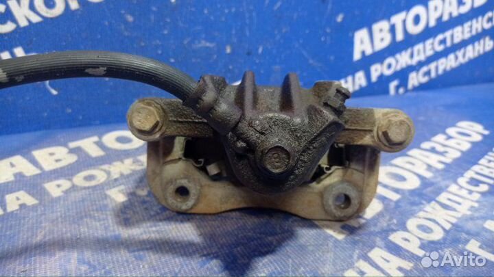 Задний левый суппорт Hyundai Elantra Hd седан G4FC