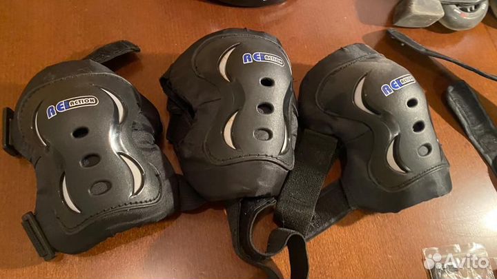 Роликовые коньки