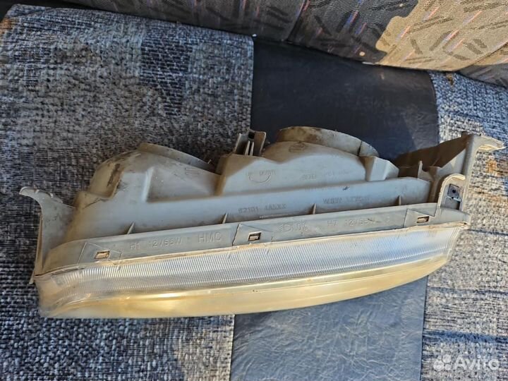 Фара левая Hyundai H-1 Starex рест. 2003