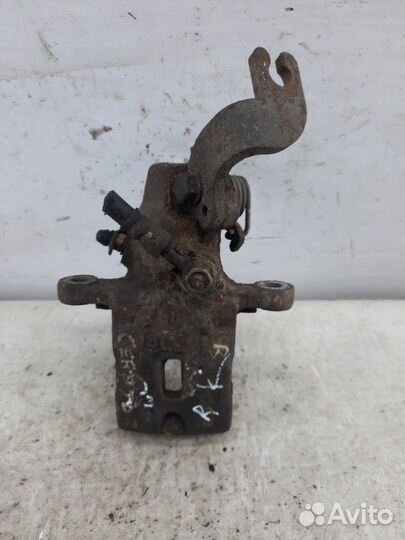 Суппорт тормозной задний правый Kia Cerato хэтчбэк