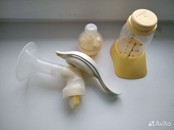 Молокоотсос medela ручной, соска calma