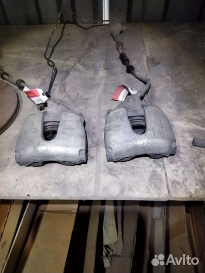 Суппорт тормозной Ford Focus 2