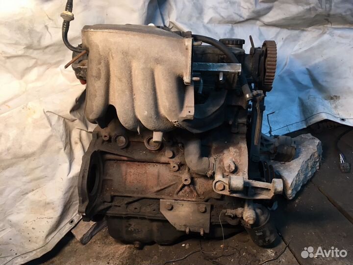 Двигатель C20NE