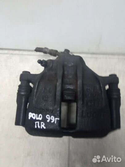 Суппорт тормозной передний правый Volkswagen Polo