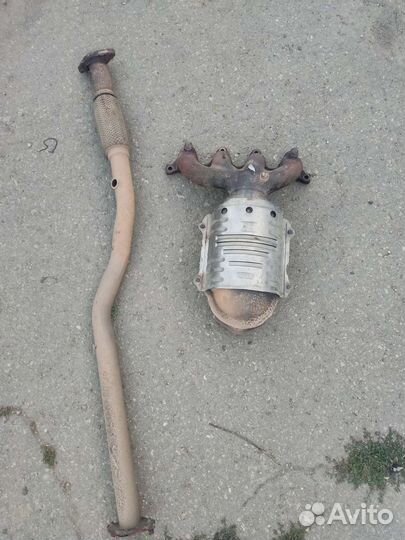 Выпускной коллектор и приёмная труба Accent