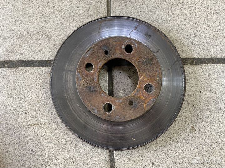 Тормозной диск передний Mitsubishi Lancer VII