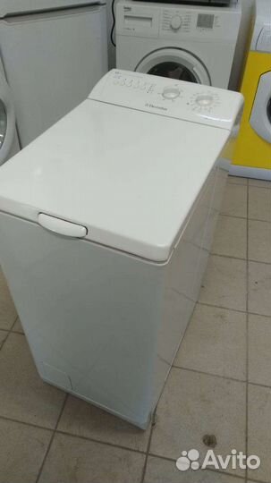 Стиральная машина с вертикальной загрузкой