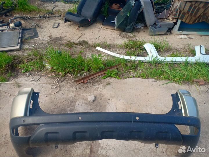 Бампер задний Mitsubishi Pajero Montero Sport