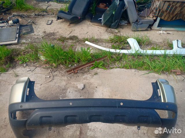 Бампер задний Mitsubishi Pajero Montero Sport