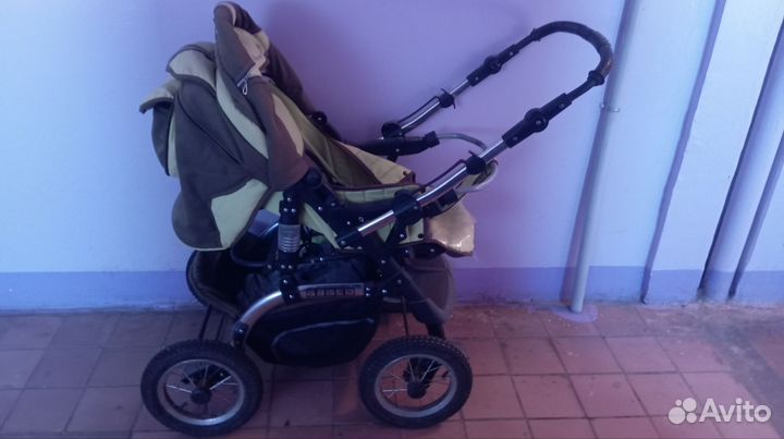 Прогулочная коляска с перекидной ручкой бу