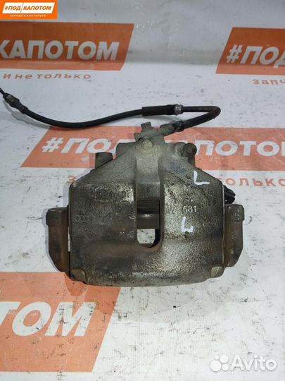 Суппорт тормозной передний левый Skoda Fabia