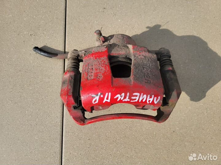 Тормозной суппорт передний правый Chevrolet Лачетт