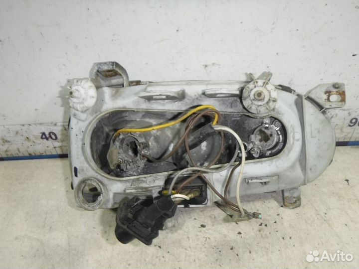 Фара левая VW Golf III