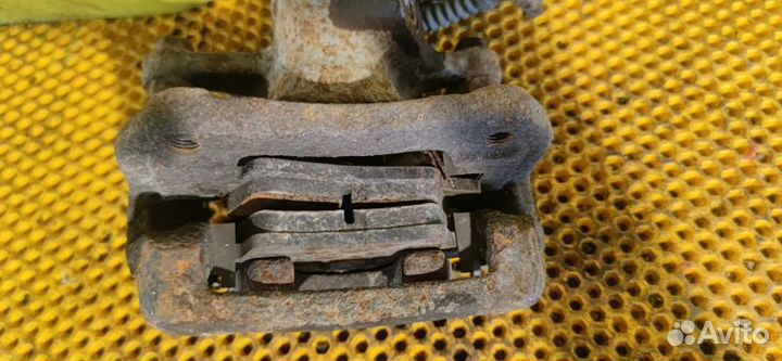 Суппорт тормозной задний правый Kia Rio