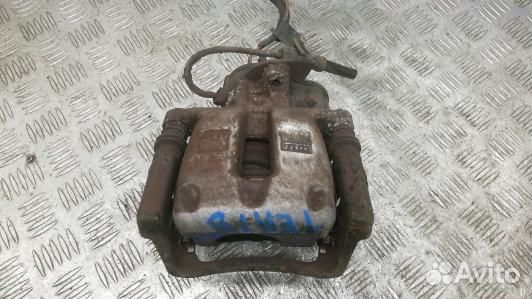 Суппорт тормозной задний левый volkswagen passat B