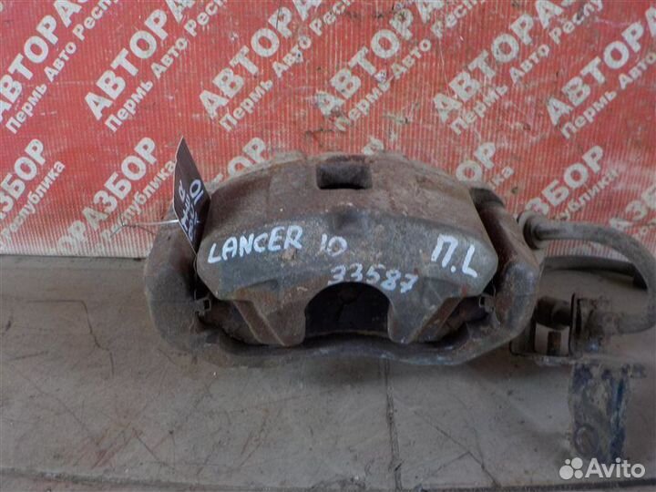 Суппорт тормозной передний левый Mitsubishi Lancer