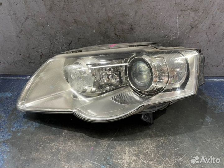 Фара ксенон левая Volkswagen Passat B6