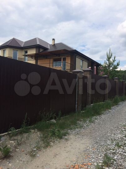 Коттедж 310 м² на участке 12 сот.